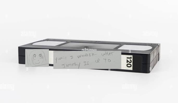 The dialog box mocked up as a handwritten label on a stock photo of a VHS tape.